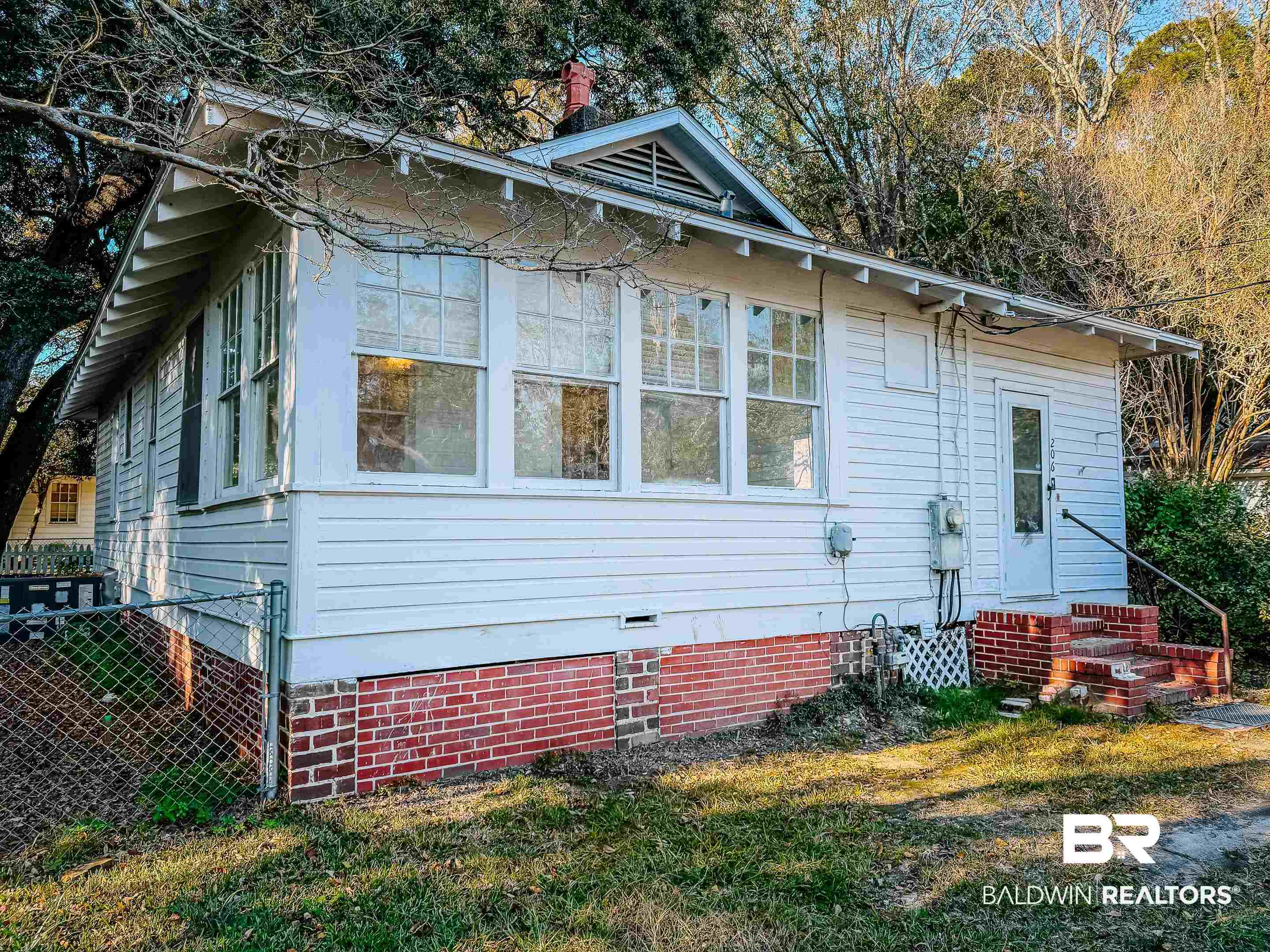 206 1st Street Mobile, AL 36611 - Photo 21 of 26 View of side of home featuring crawl space