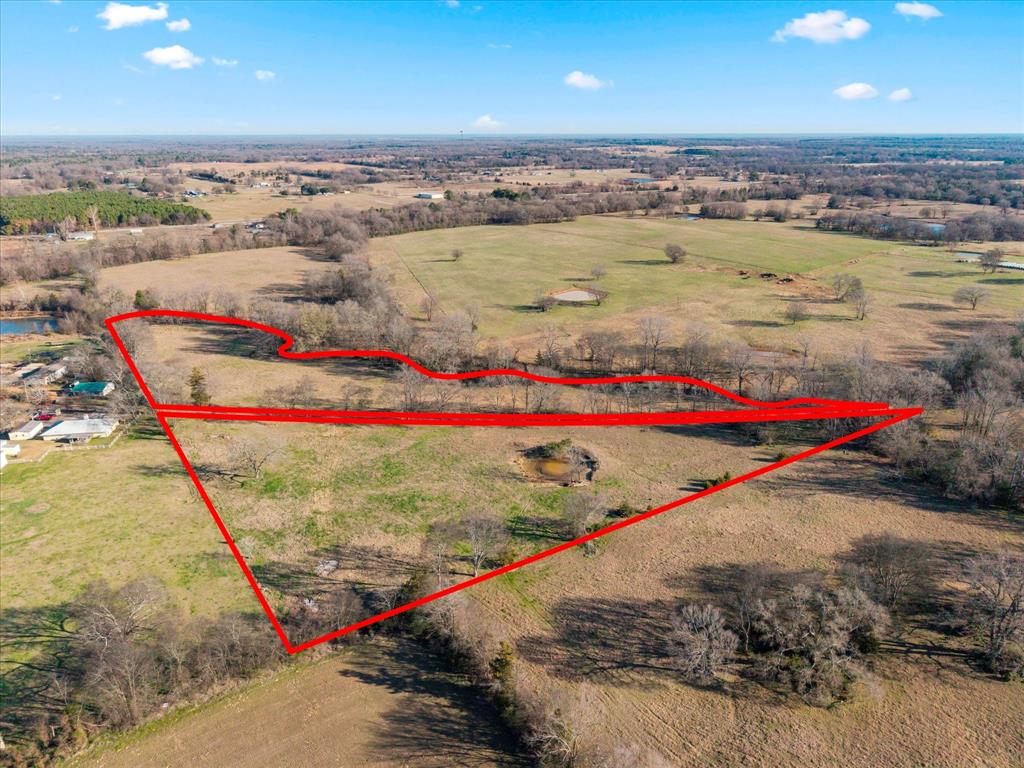 Tbd 4315th Cookville, TX 75558 - Photo 22 of 23 an aerial view of residential houses with outdoor space