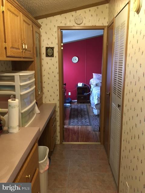 210 Berwick Road Abbottstown, PA 17301 - Photo 15 of 30 Hallway through kitchen to master.
