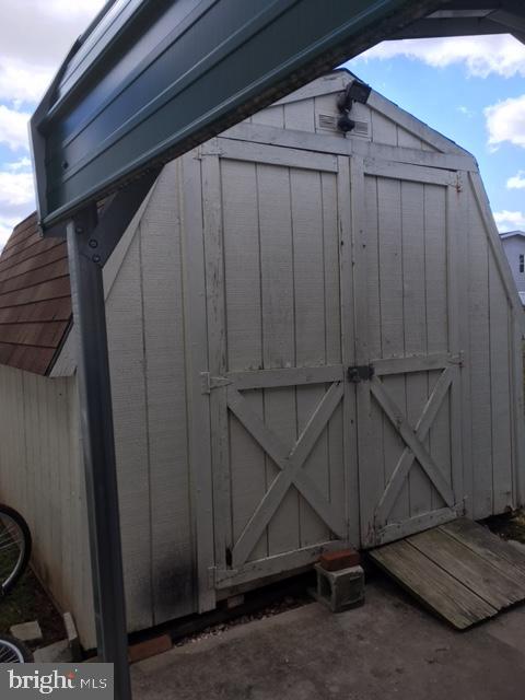 210 Berwick Road Abbottstown, PA 17301 - Photo 28 of 30 Shed with shelving for storage!