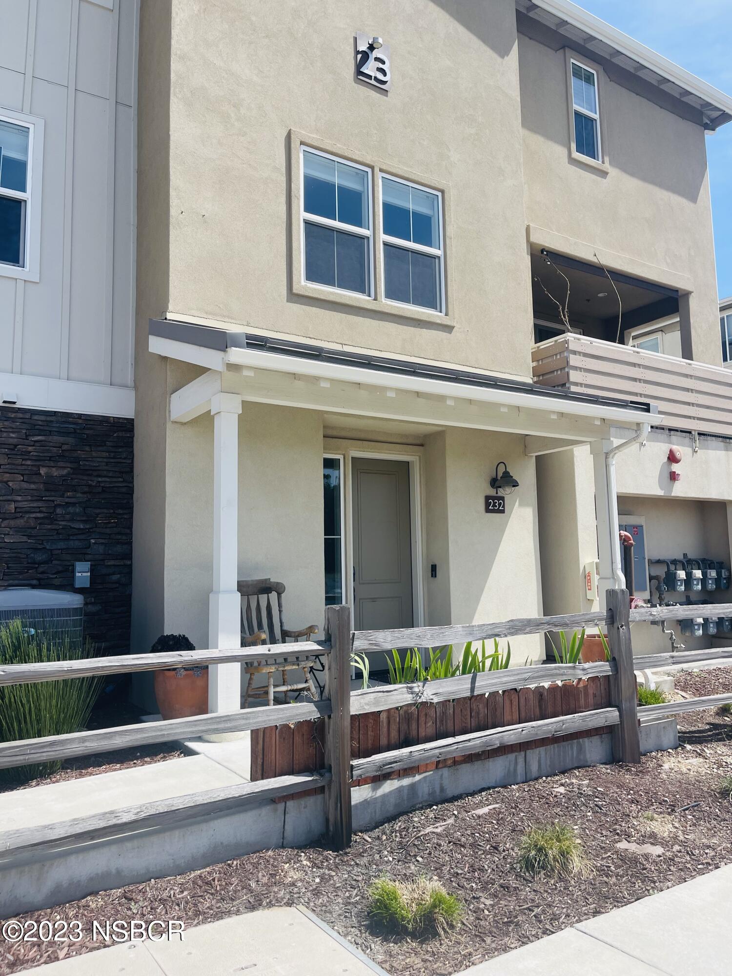 a view of living room and kitchen