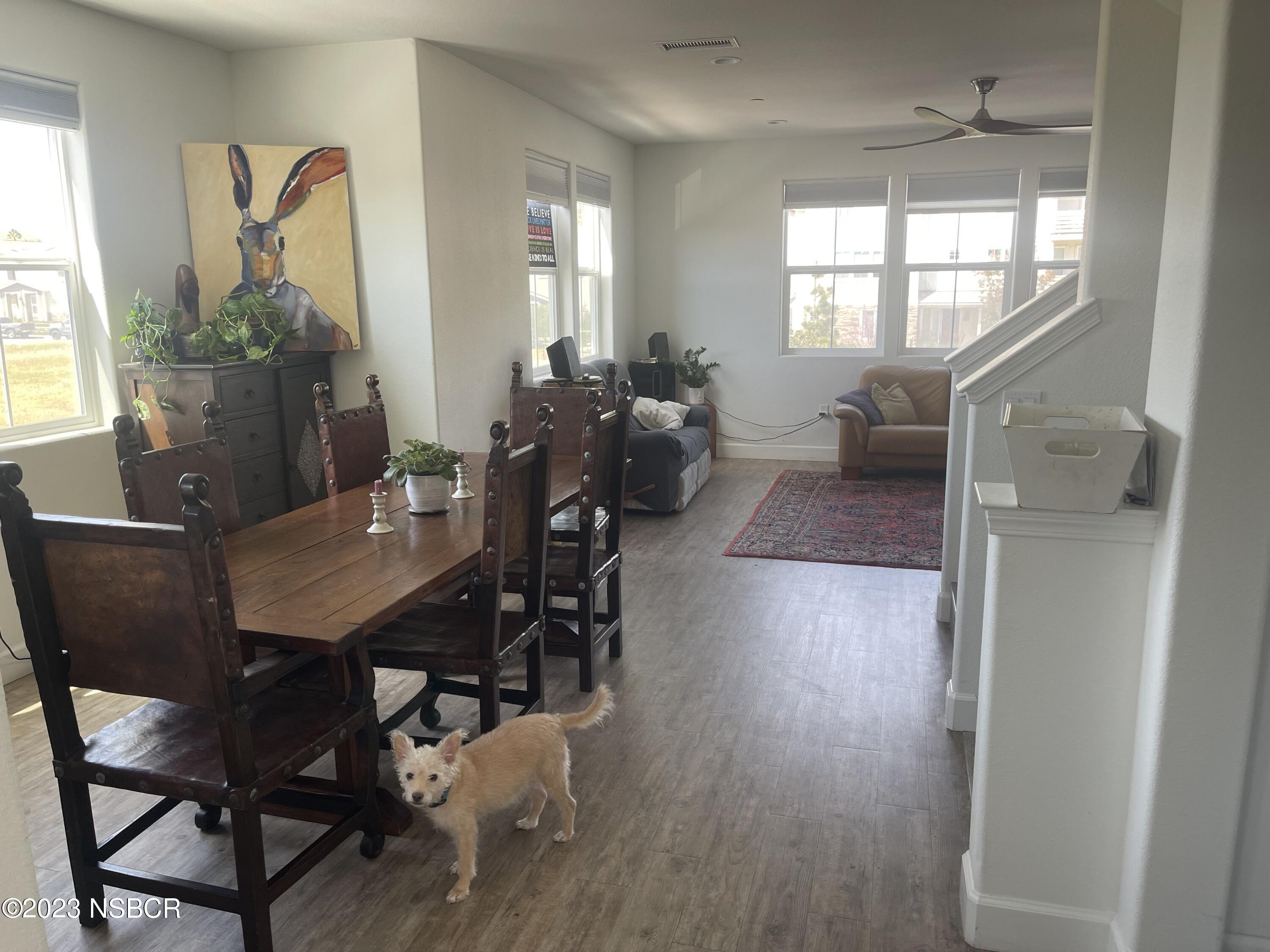 232 Robles Way Buellton, CA 93427 - Photo 3 of 6 a view of a dining room with furniture window and wooden floor