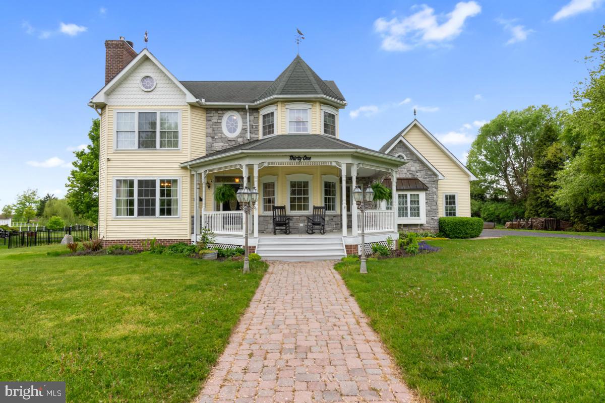 31 Quail Court Littlestown, PA 17340 - Photo 2 of 26 a front view of a house with a yard