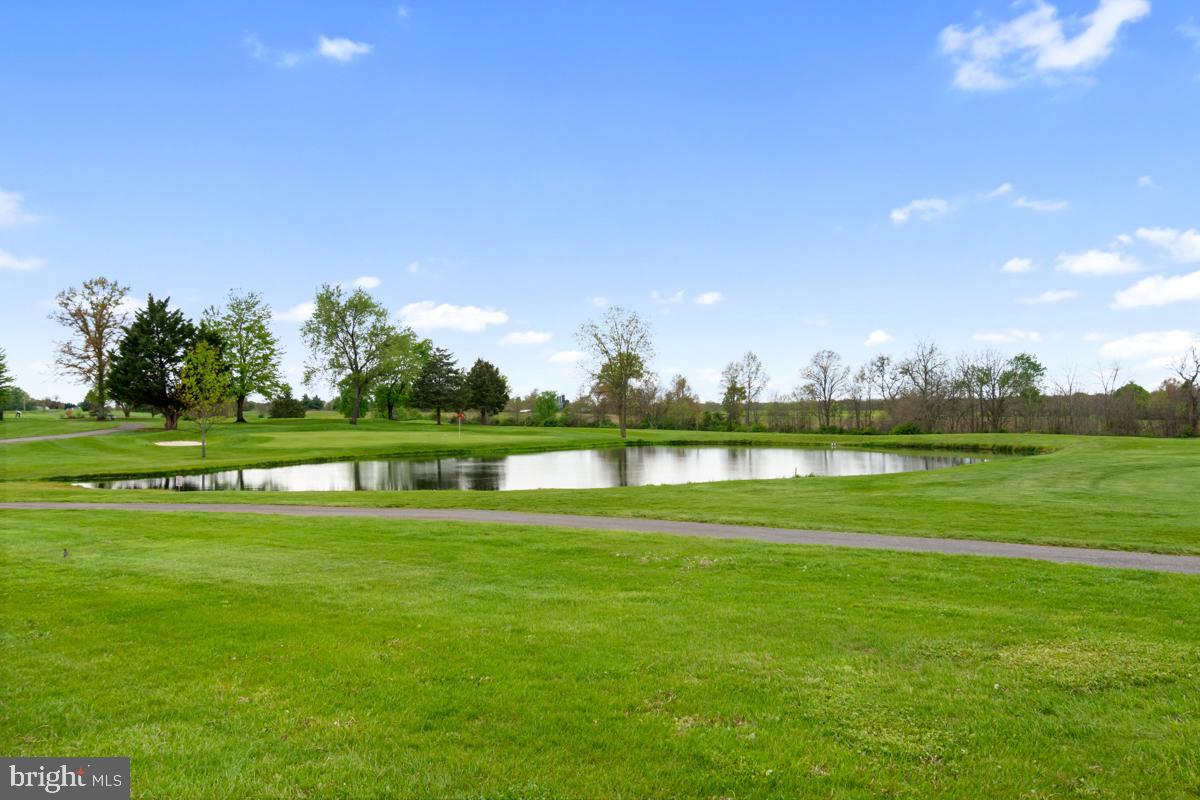 31 Quail Court Littlestown, PA 17340 - Photo 25 of 26 a view of a golf course with a lake view