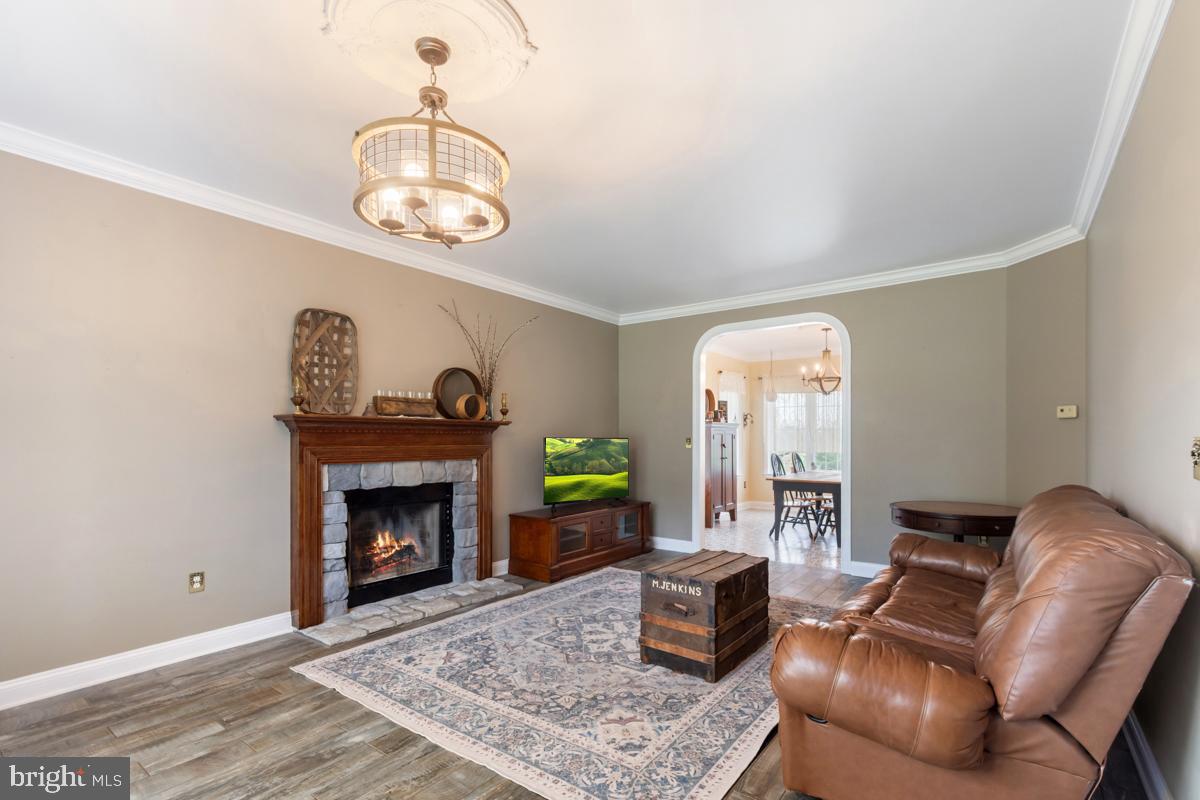 31 Quail Court Littlestown, PA 17340 - Photo 4 of 26 a living room with furniture and a fireplace