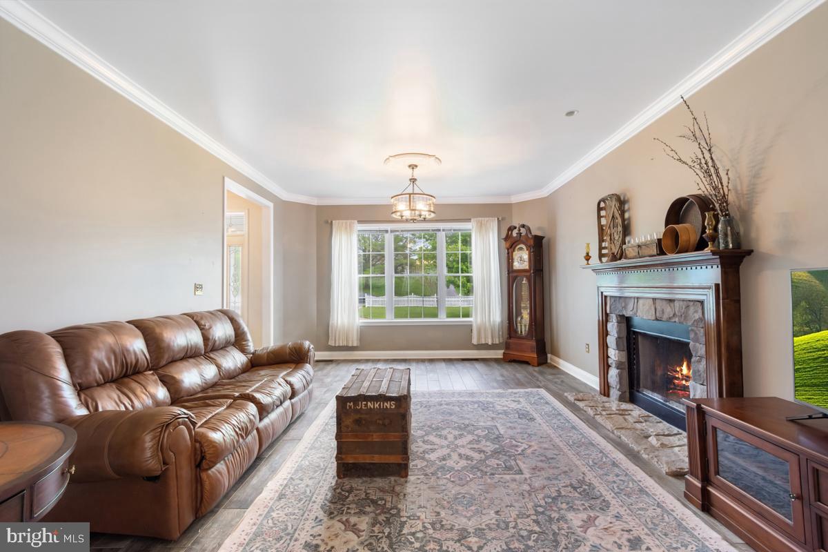 31 Quail Court Littlestown, PA 17340 - Photo 5 of 26 a living room with furniture window and a fireplace