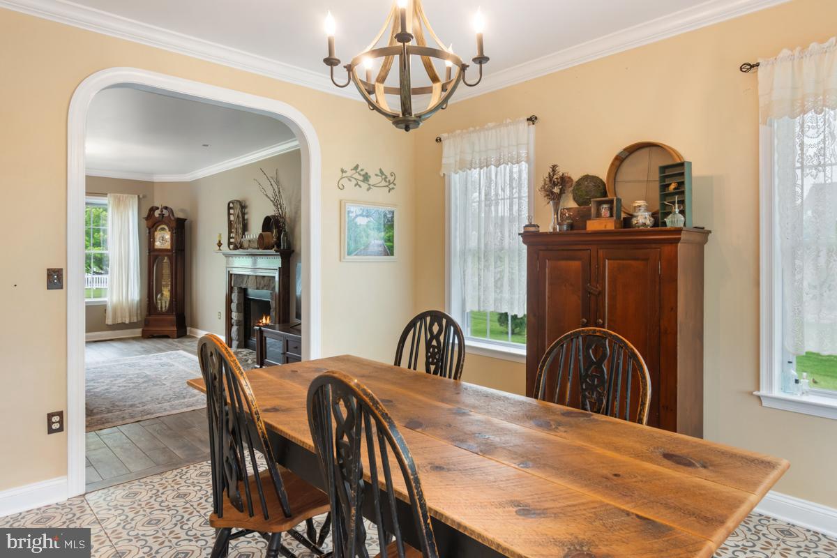 31 Quail Court Littlestown, PA 17340 - Photo 7 of 26 a view of a dining room with furniture and chandelier