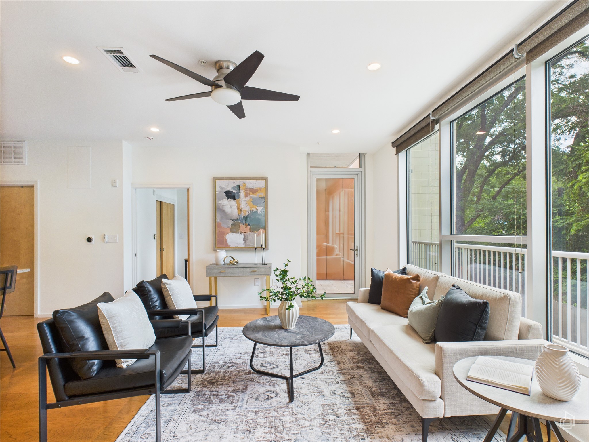 1600 Barton Springs Road, Unit 5107 Austin, TX 78704 - Photo 1 of 1 a living room with furniture and a large window