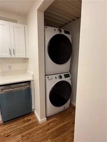 a view of a hallway with washer and dryer