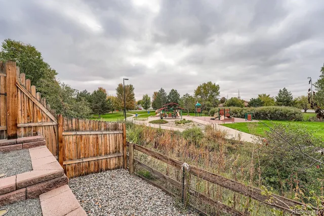 a view of a terrace with yard