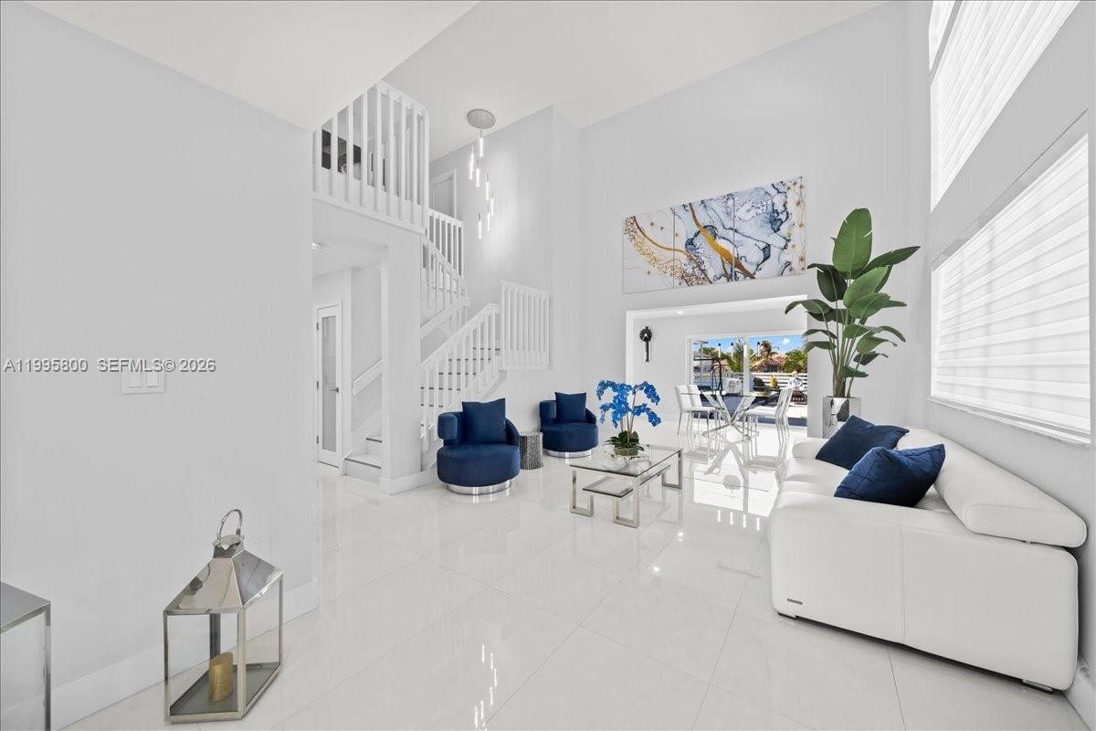 15341 Southwest 36th Street Miami, FL 33185 - Photo 16 of 56 a view of living room filled with furniture and a potted plant