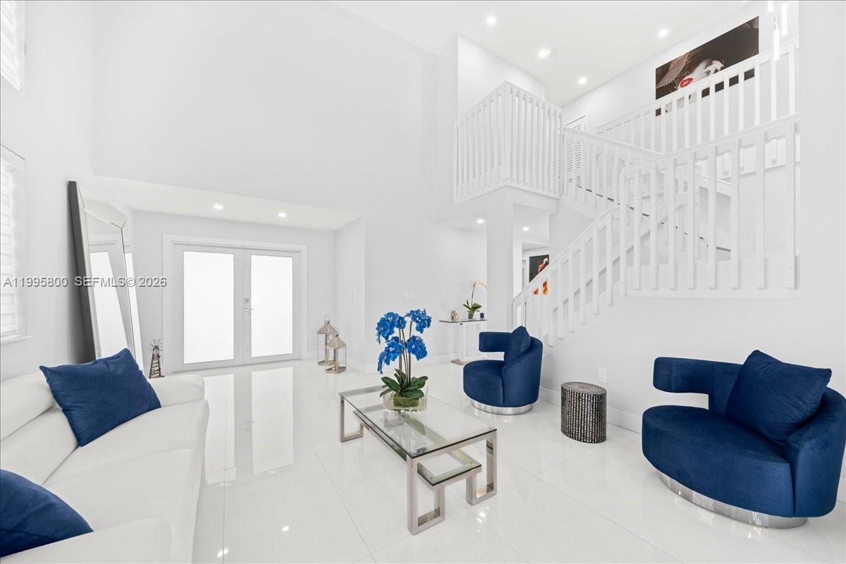 15341 Southwest 36th Street Miami, FL 33185 - Photo 20 of 56 a living room with furniture and a potted plant