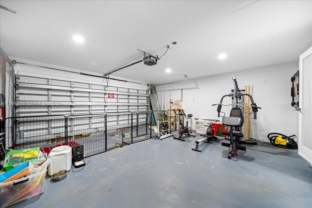 15341 Southwest 36th Street Miami, FL 33185 - Photo 44 of 56 a view of a room with gym equipment