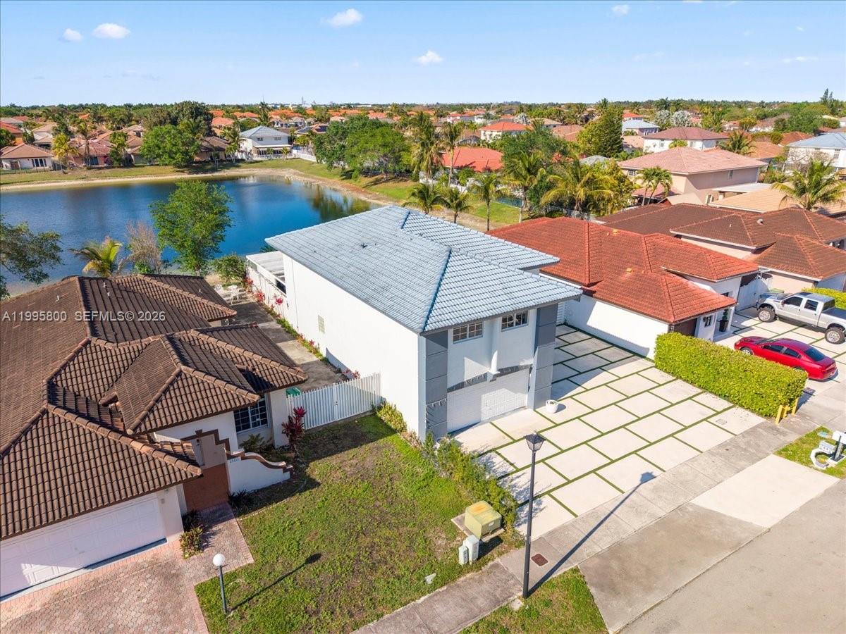 15341 Southwest 36th Street Miami, FL 33185 - Photo 48 of 56 an aerial view of a house with a ocean view