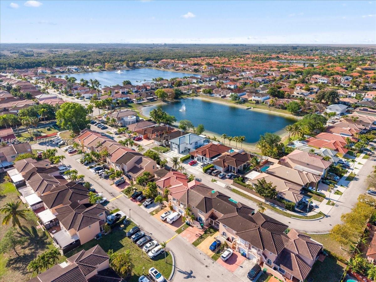 15341 Southwest 36th Street Miami, FL 33185 - Photo 49 of 56 an aerial view of residential houses with outdoor space