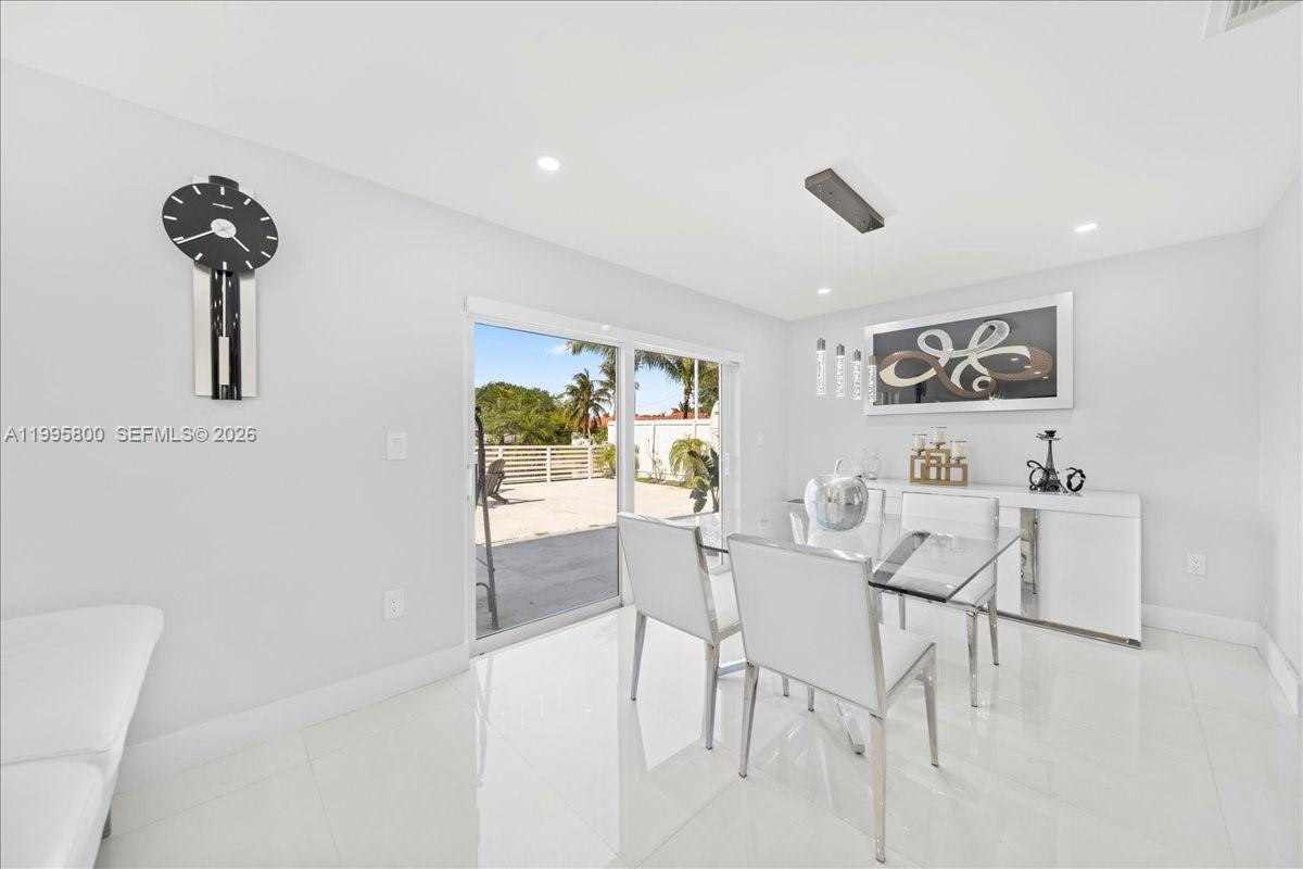 15341 Southwest 36th Street Miami, FL 33185 - Photo 10 of 56 a view of a dining room with furniture