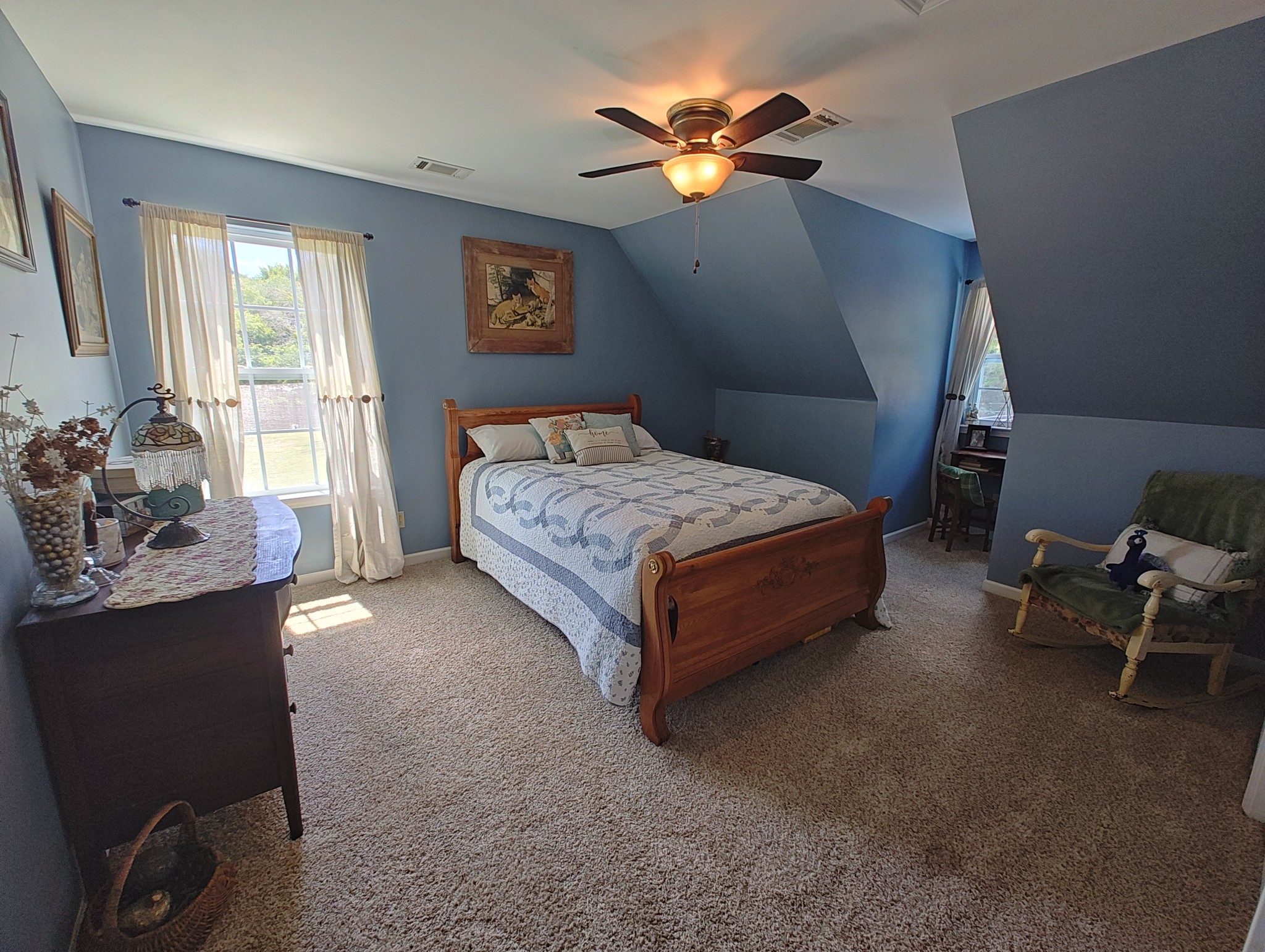 2770 Beech Log Road Watertown, TN 37184 - Photo 47 of 87 a spacious bedroom with a bed and a chandelier