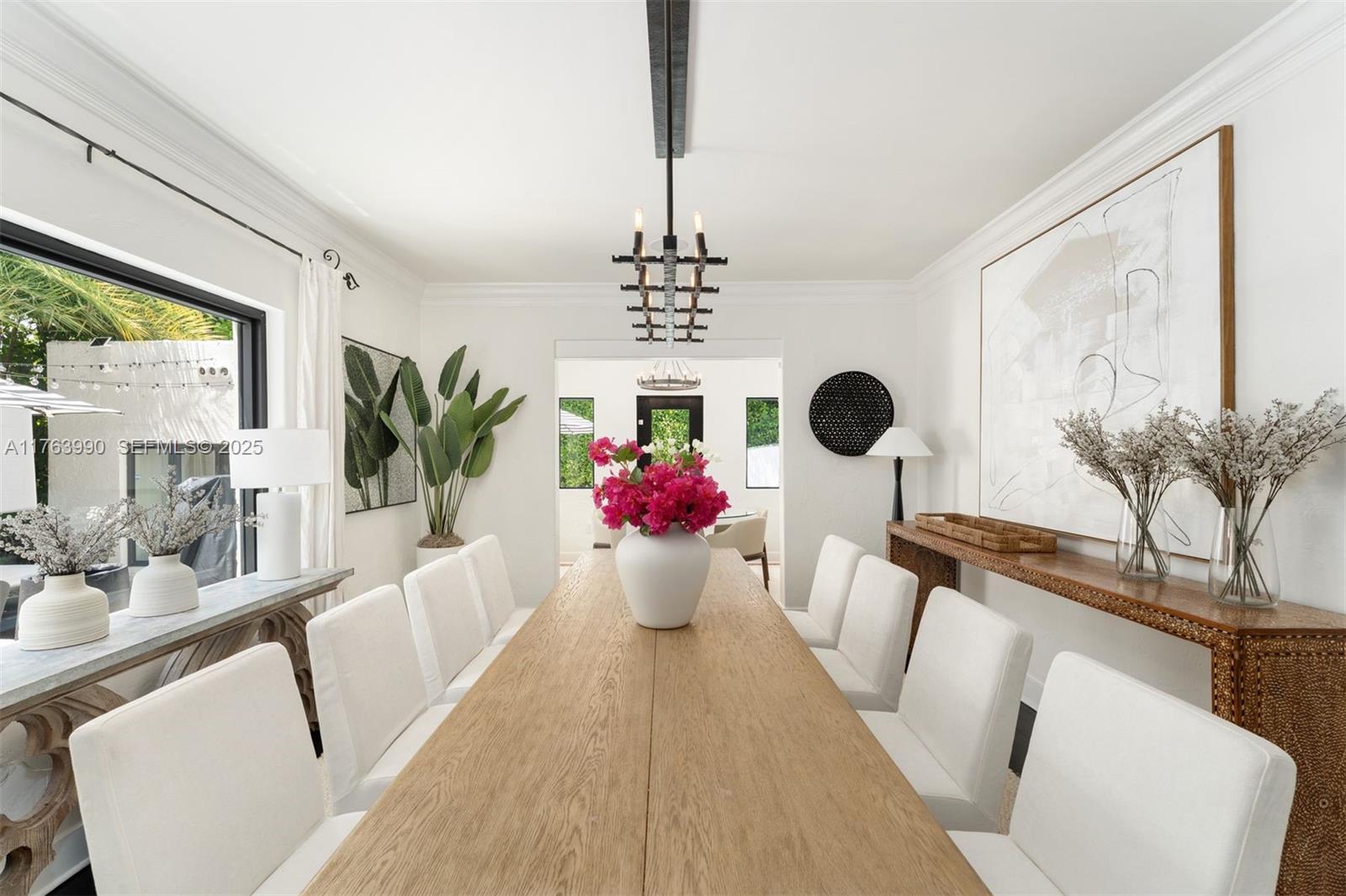 4430 Alton Road Miami Beach, FL 33140 - Photo 12 of 47 a dining room with furniture and window