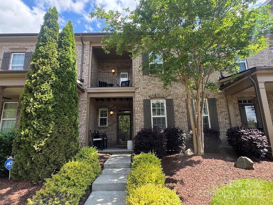 a front view of a house with a porch