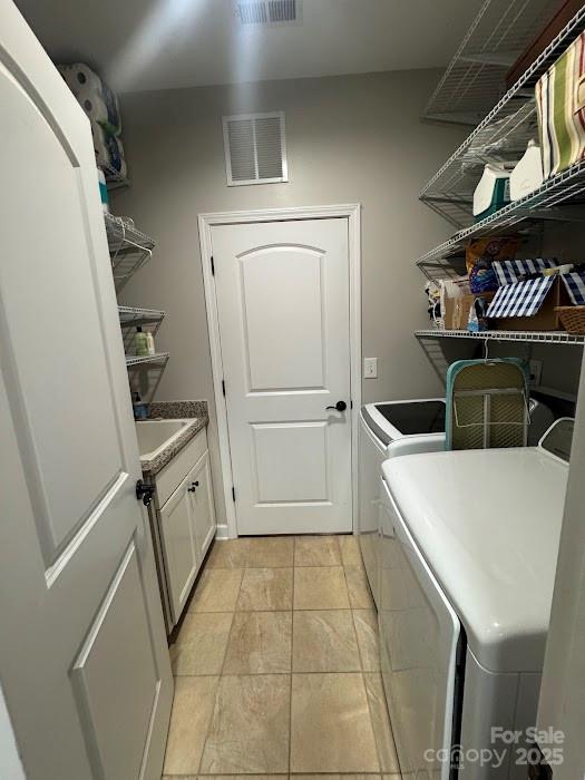 2279 Eversham Drive Northwest Concord, NC 28027 - Photo 12 of 28 a kitchen with a refrigerator and a sink