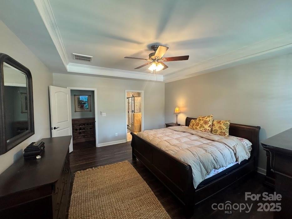 2279 Eversham Drive Northwest Concord, NC 28027 - Photo 14 of 28 a bedroom with a bed and a flat screen tv