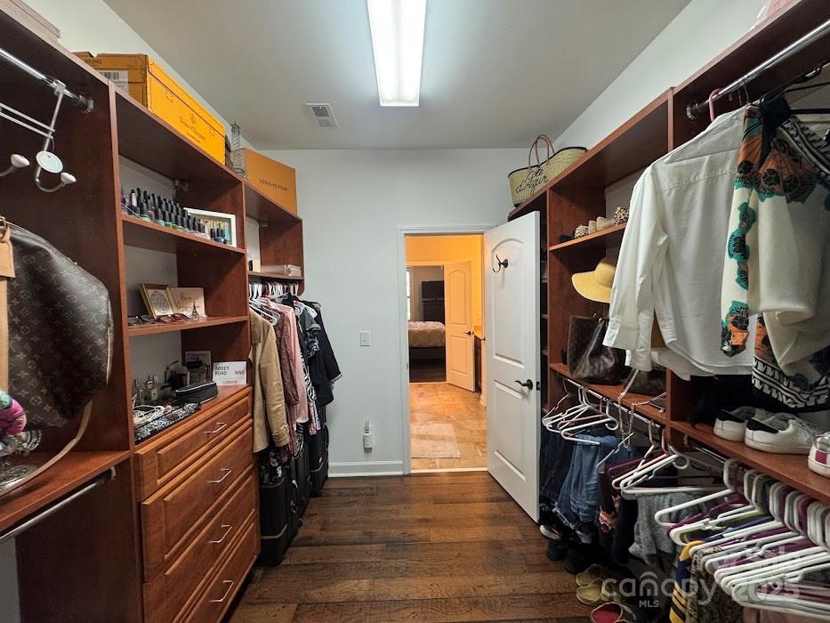 2279 Eversham Drive Northwest Concord, NC 28027 - Photo 16 of 28 a view of walk in closet with clothes and shoes