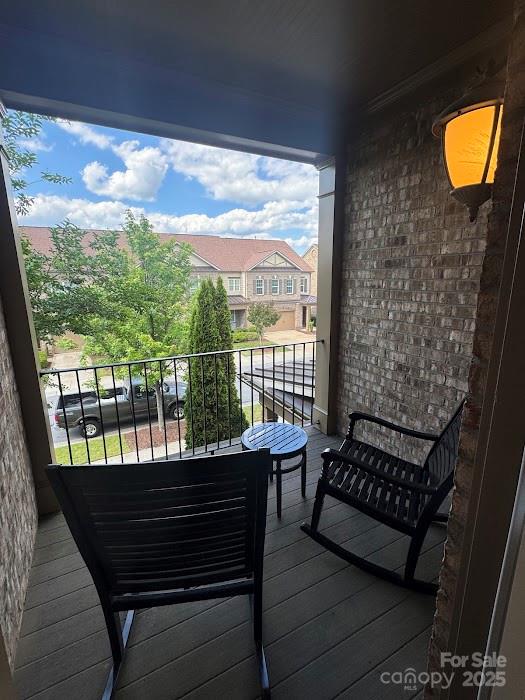 2279 Eversham Drive Northwest Concord, NC 28027 - Photo 20 of 28 a view of a two chairs in the balcony