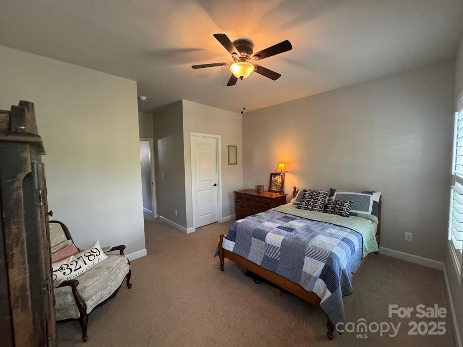 2279 Eversham Drive Northwest Concord, NC 28027 - Photo 22 of 28 a bedroom with bed and window