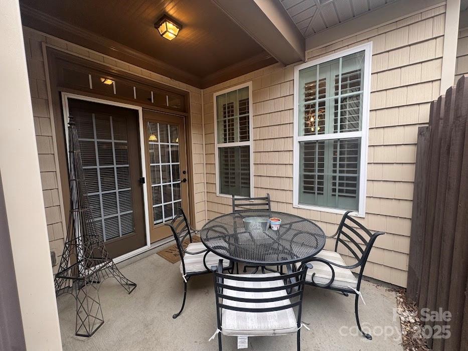 2279 Eversham Drive Northwest Concord, NC 28027 - Photo 24 of 28 a view of a room that has a table and chairs