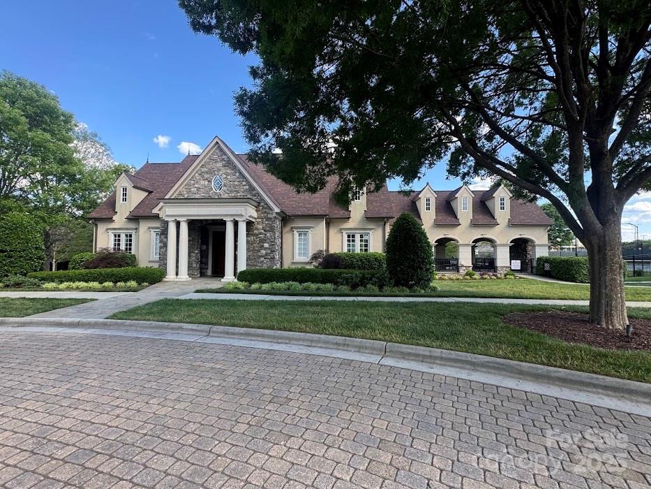 2279 Eversham Drive Northwest Concord, NC 28027 - Photo 26 of 28 a front view of a house with a yard