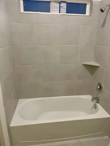 a bathroom with a bathtub
