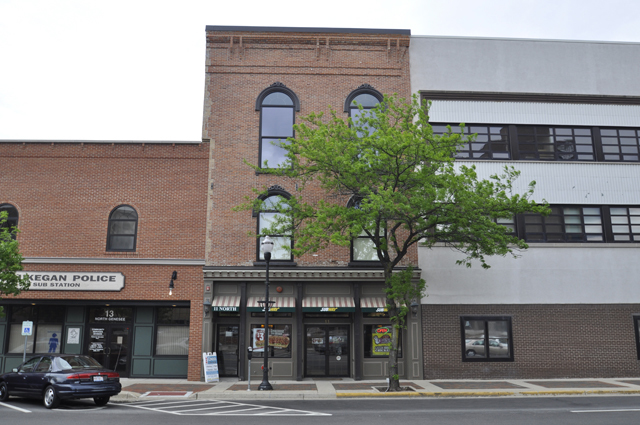11 North Genesee Street, Unit 200 Waukegan, IL 60085 - Photo 1 of 8 a view of a building entrance and a street