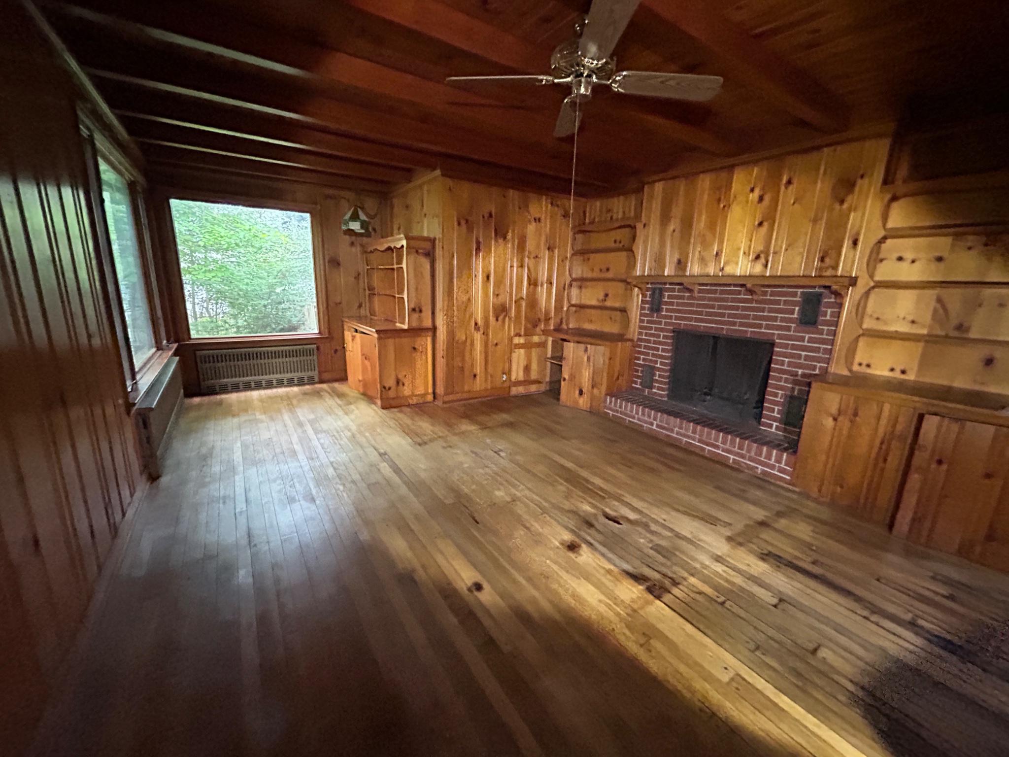 17233 Mountain View Road Emmitsburg, MD 21727 - Photo 2 of 16 Cozy living room with wooden charm.