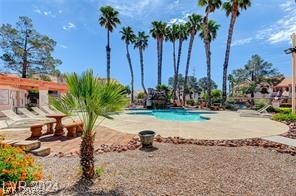 7570 West Flamingo Road, Unit 125 Las Vegas, NV 89147 - Photo 14 of 29 Community pool with a patio