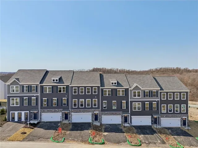 a view of a big yard in front of the house