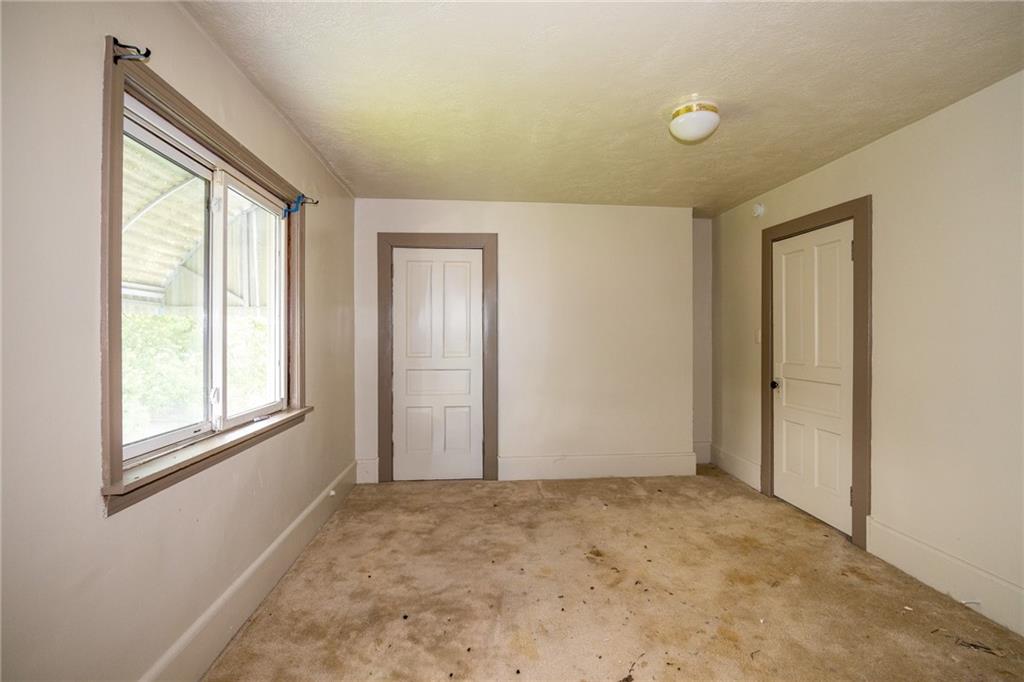 511 2nd Street Monessen, PA 15062 - Photo 11 of 21 an empty room with windows