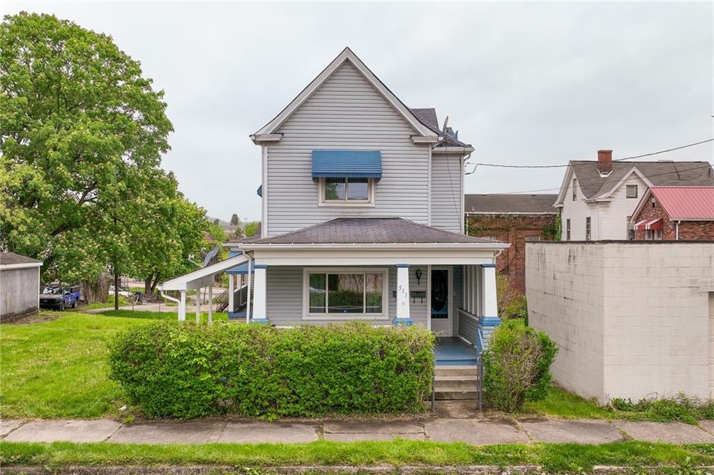 511 2nd Street Monessen, PA 15062 - Photo 2 of 21 a front view of a house with garden