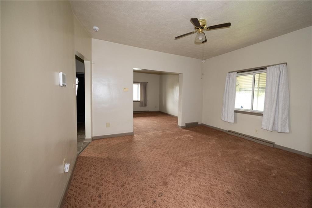 511 2nd Street Monessen, PA 15062 - Photo 8 of 21 an empty room with fan and windows