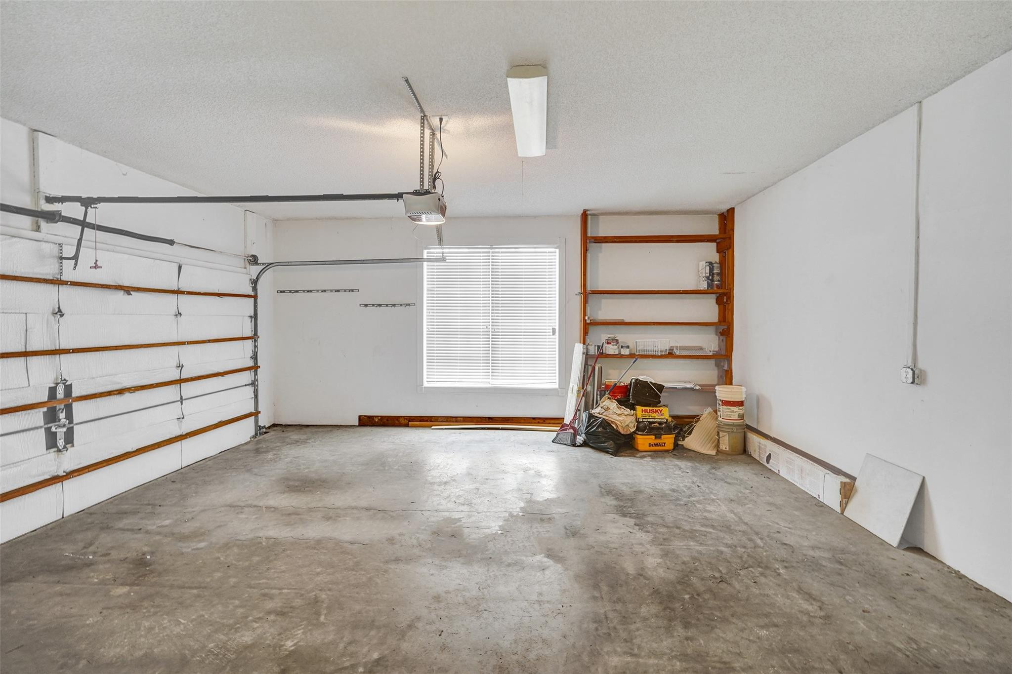 10902 Tamoron Lane Boca Raton, FL 33498 - Photo 64 of 66 an empty room with natural light and window