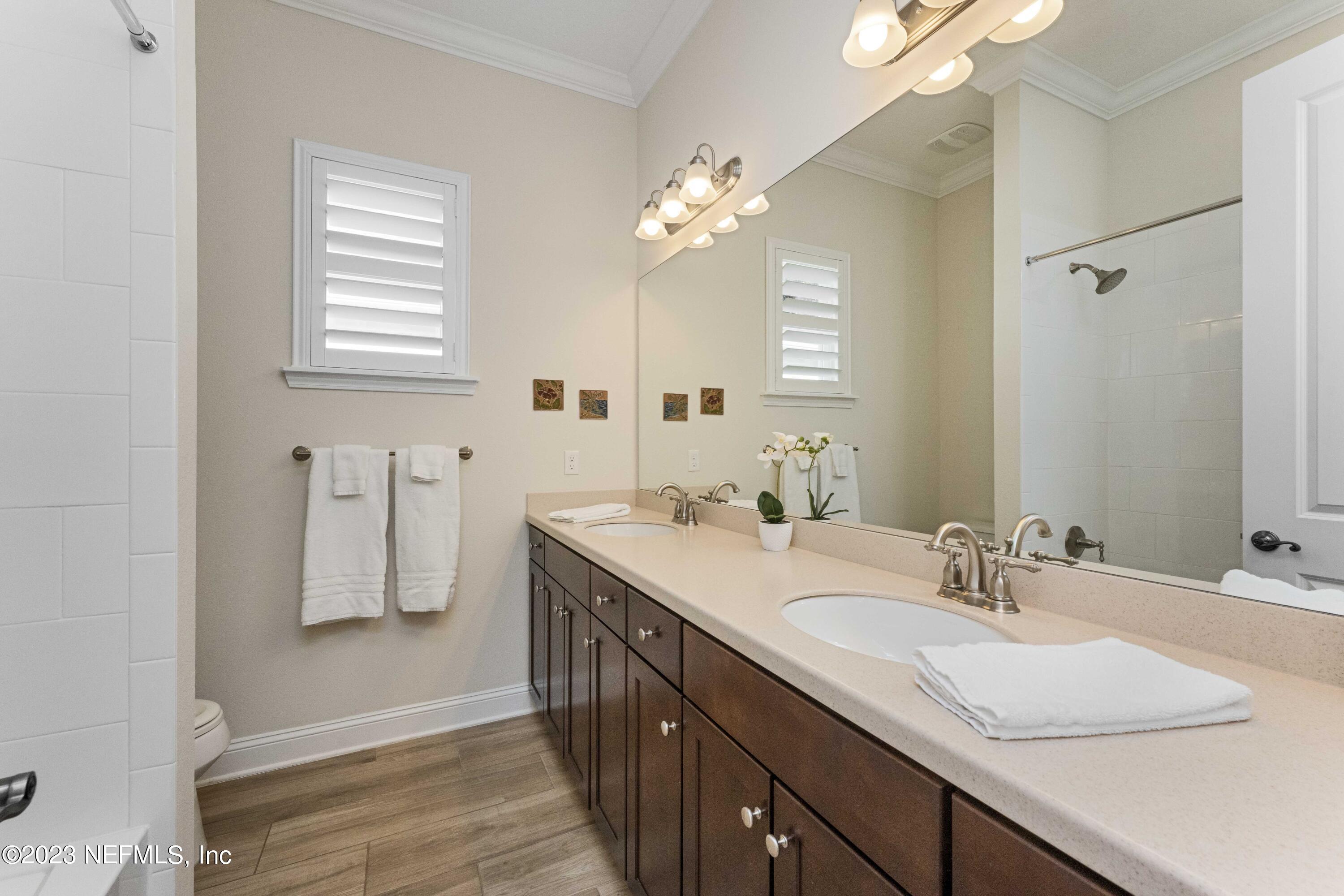 515 Park Forest Drive Ponte Vedra, FL 32081 - Photo 31 of 106 a bathroom with a sink double vanity granite and a shower