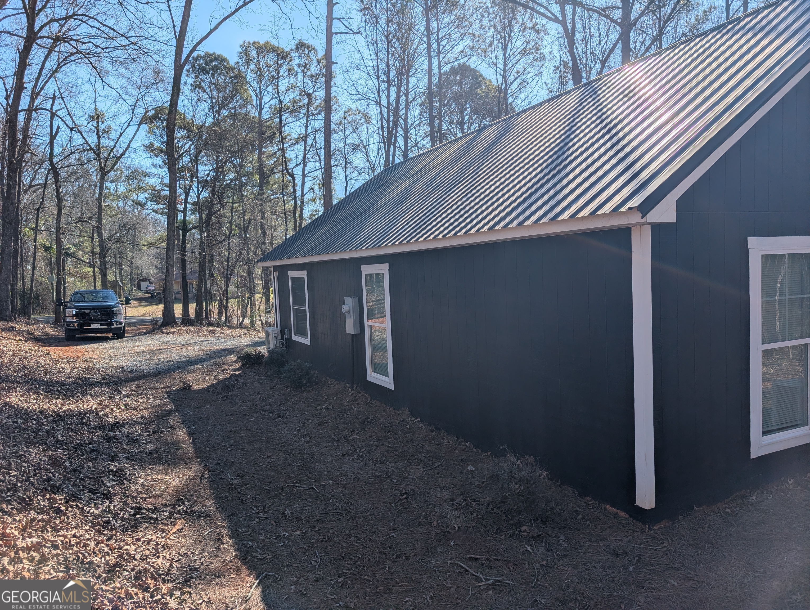 232 Chestnut Grove Road Shiloh, GA 31826 - Photo 6 of 22 a view of a house with a yard