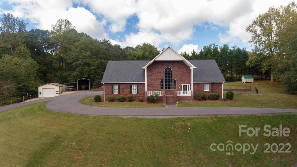 200 Range Road Kings Mountain, NC 28086 - Photo 2 of 45 a front view of a house with a yard