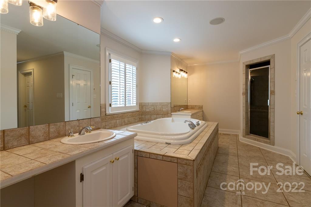 200 Range Road Kings Mountain, NC 28086 - Photo 24 of 45 a bathroom with a sink double vanity and a mirror