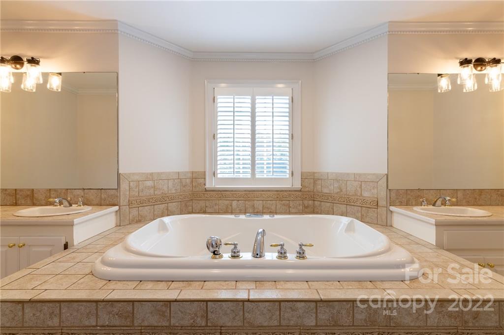 200 Range Road Kings Mountain, NC 28086 - Photo 25 of 45 a bathroom with bathtub and window