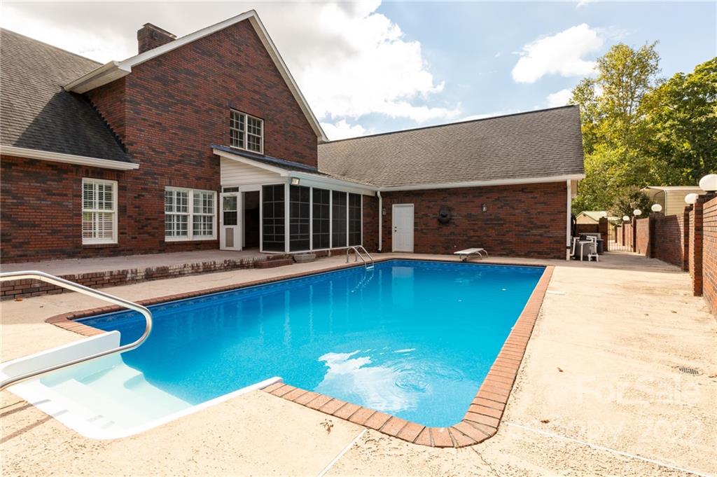 200 Range Road Kings Mountain, NC 28086 - Photo 3 of 45 a view of a house with swimming pool