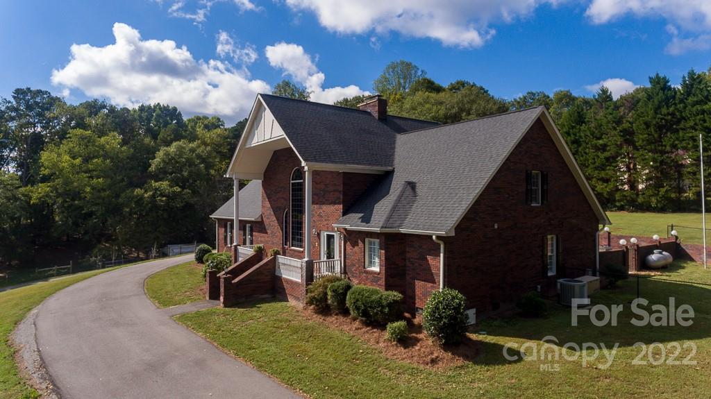 200 Range Road Kings Mountain, NC 28086 - Photo 4 of 45 a view of a house with a yard