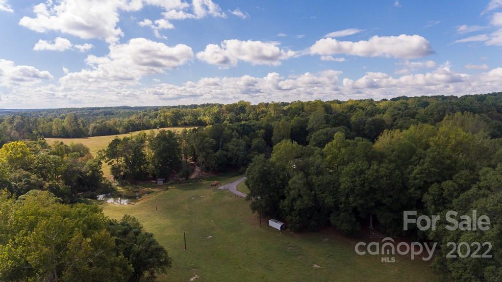 200 Range Road Kings Mountain, NC 28086 - Photo 44 of 45 a view of a city with lush green forest