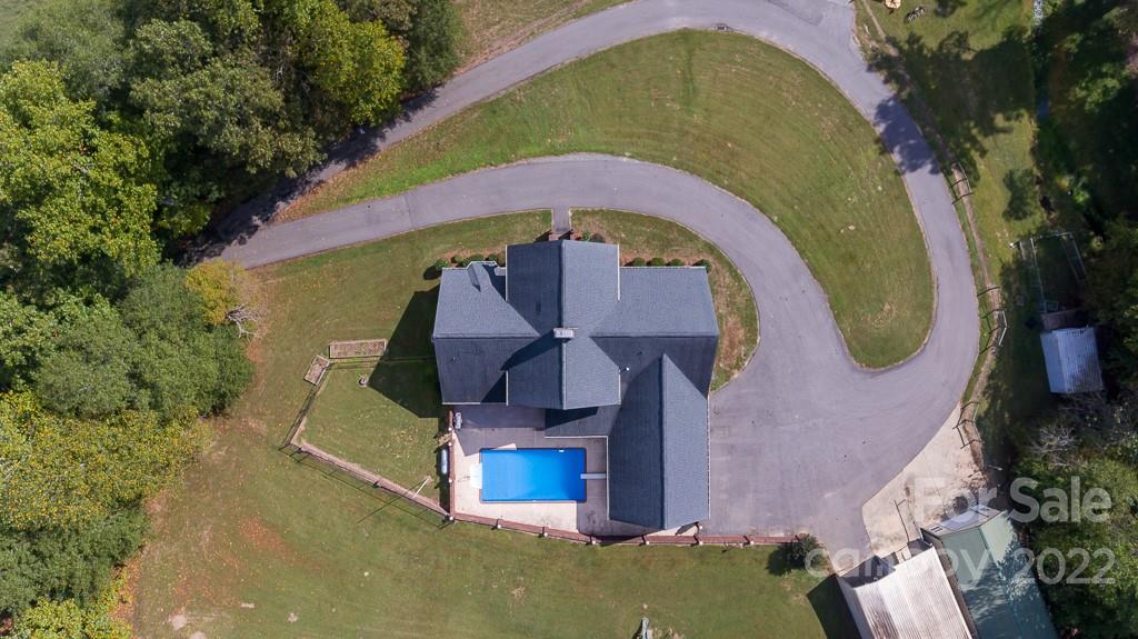 200 Range Road Kings Mountain, NC 28086 - Photo 5 of 45 an aerial view of swimming pool a yard and outdoor seating