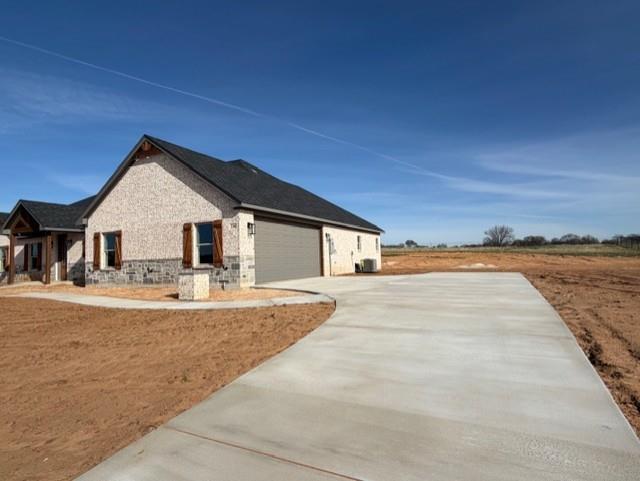 230 Kilkenny Road Poolville, TX 76487 - Photo 2 of 22 a view of house and outdoor space