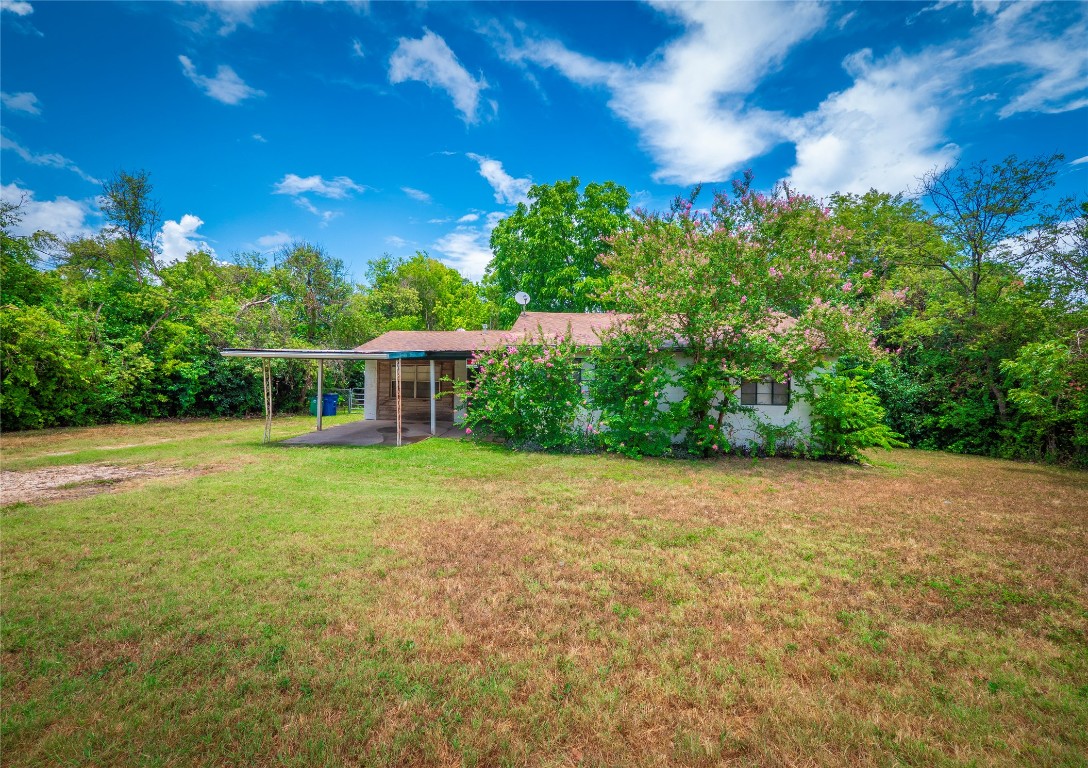 1806 Fortview Road Austin, TX 78704 - Photo 12 of 26 a view of a house with backyard and sitting area